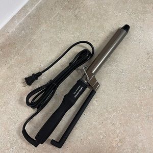 eagle fortress curling iron brand new.